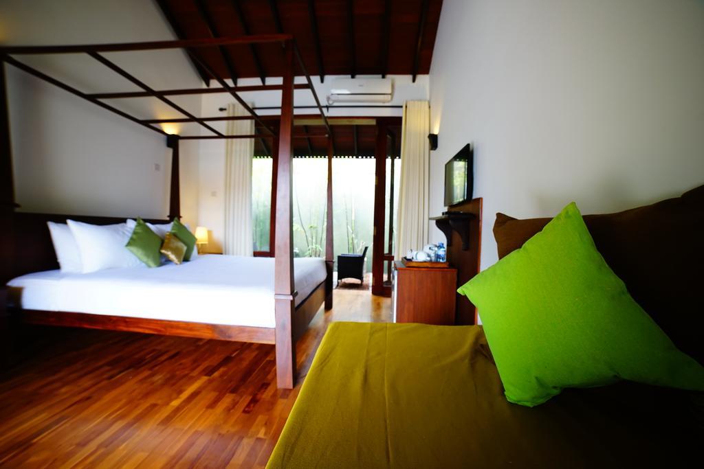 Lespri Grand Hotel Negombo Szoba fotó