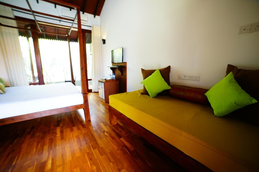 Lespri Grand Hotel Negombo Szoba fotó